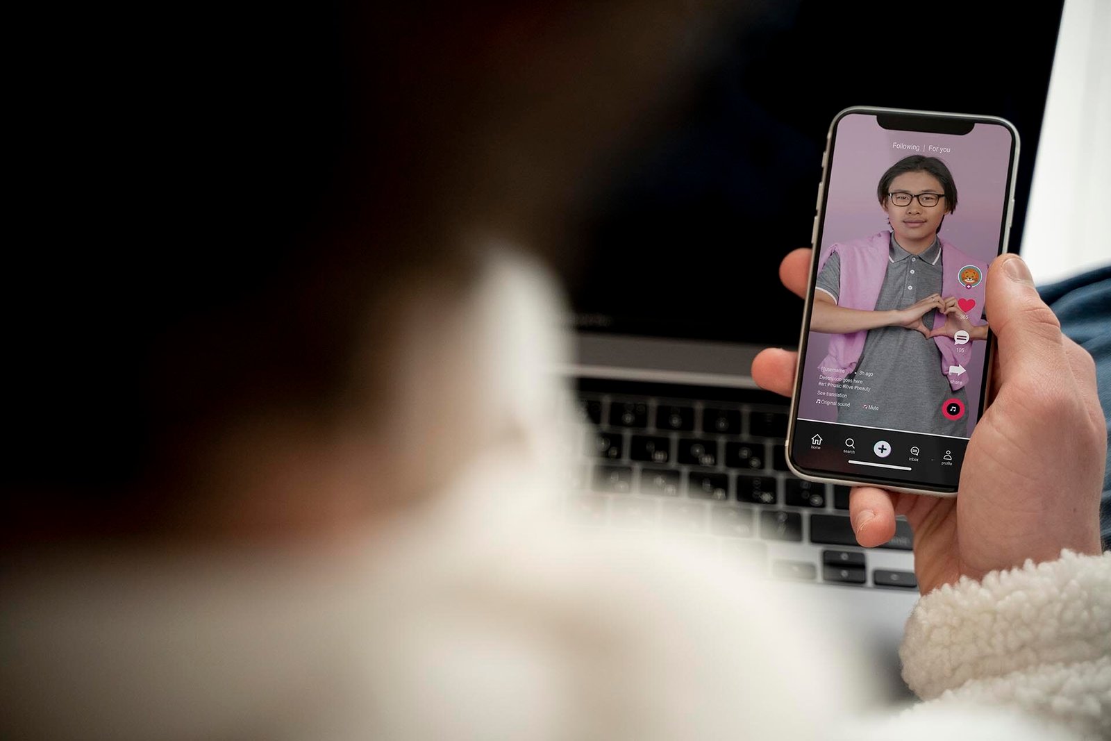 teenager-watching-video-using-his-smartphone-while-sitting-his-bed copy